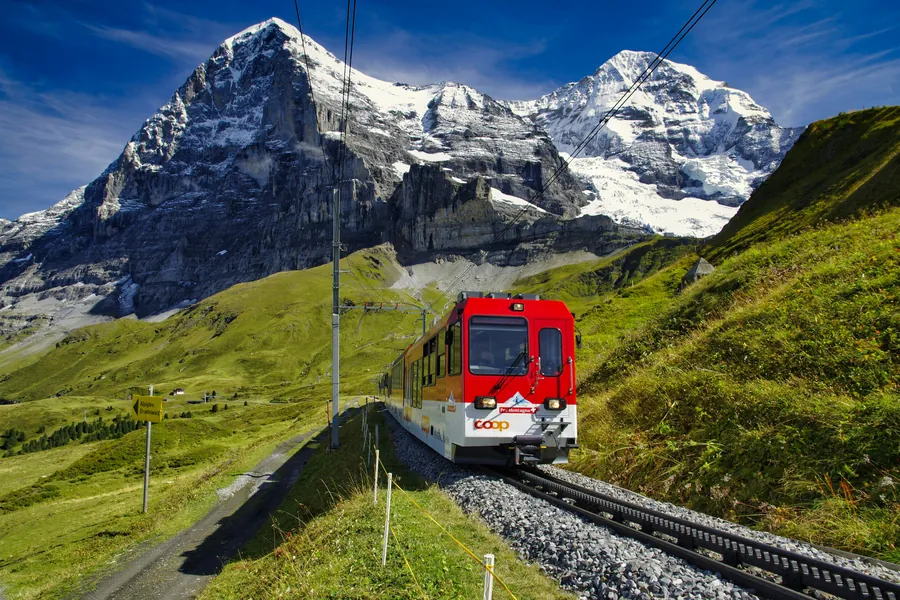 Red mountain train below the Eiger, Switzerland