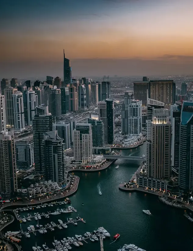 Dubai Marina skyline and yachts at dusk seen from above